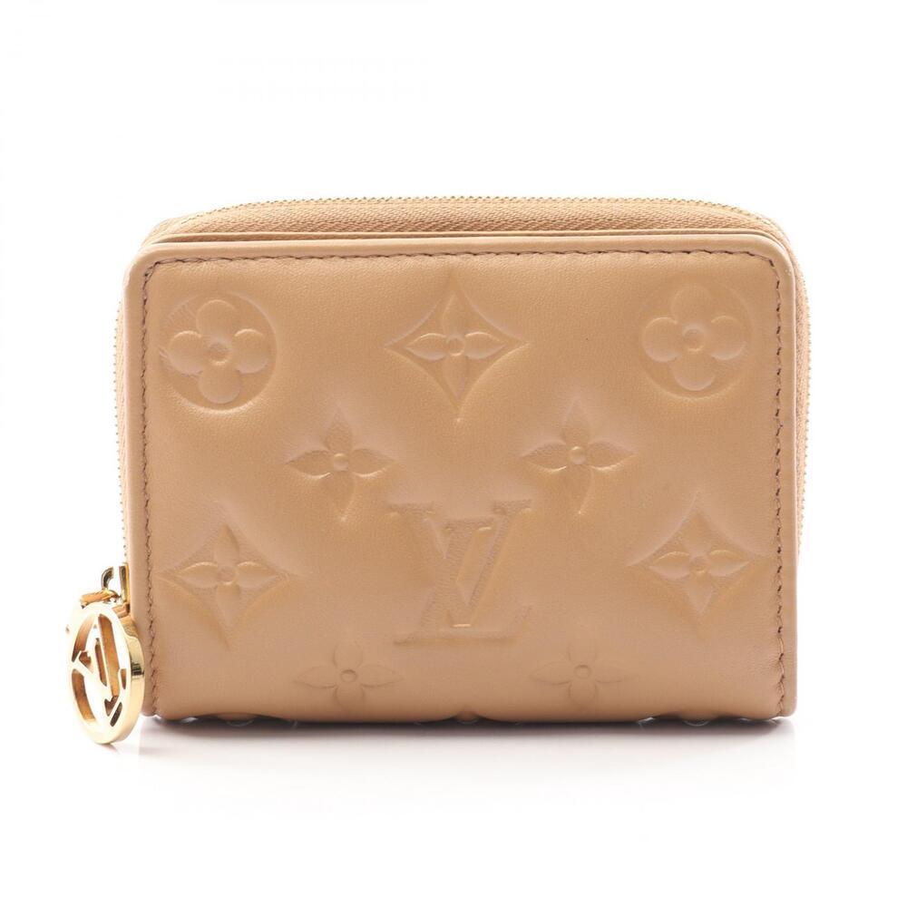 Louis Vuitton Portefeuille Lou Bifold Wallet Leather Monogram Embossed Beige Tan